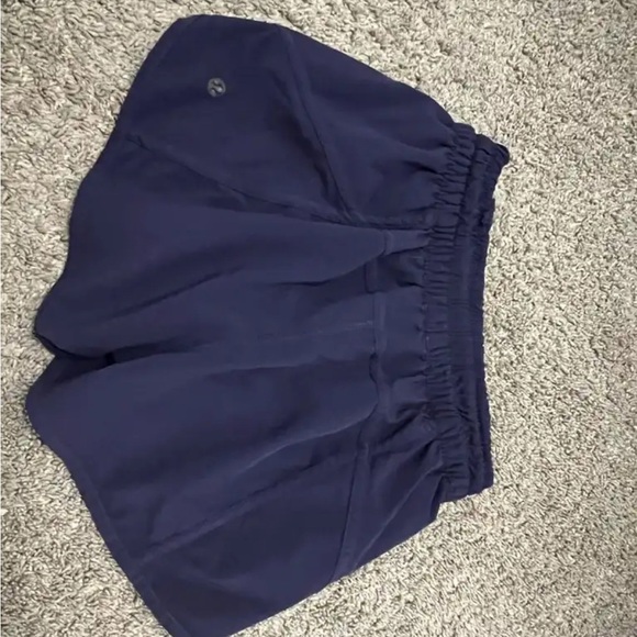 Lululemon size 4 navy shorts 3 inch inseam, worn but good condition - Picture 2 of 3
